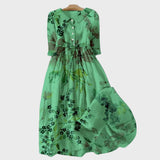 Robe verte avec des fleurs ombragées