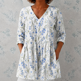 Jeanne | Blouse en lin longue avec des bouquets de fleurs aquarellées