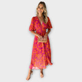 Katty – Robe midi avec décolleté en V, motif floral et manches bouffantes