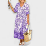 Caitlin - Robe fleurie gracieuse avec un design aérien