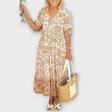 Caitlin - Robe fleurie gracieuse avec un design aérien