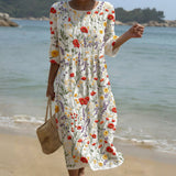 Cristina - Robe maxi avec col rond et motif floral