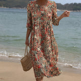 Sara - Robe maxi avec encolure ronde et motif floral